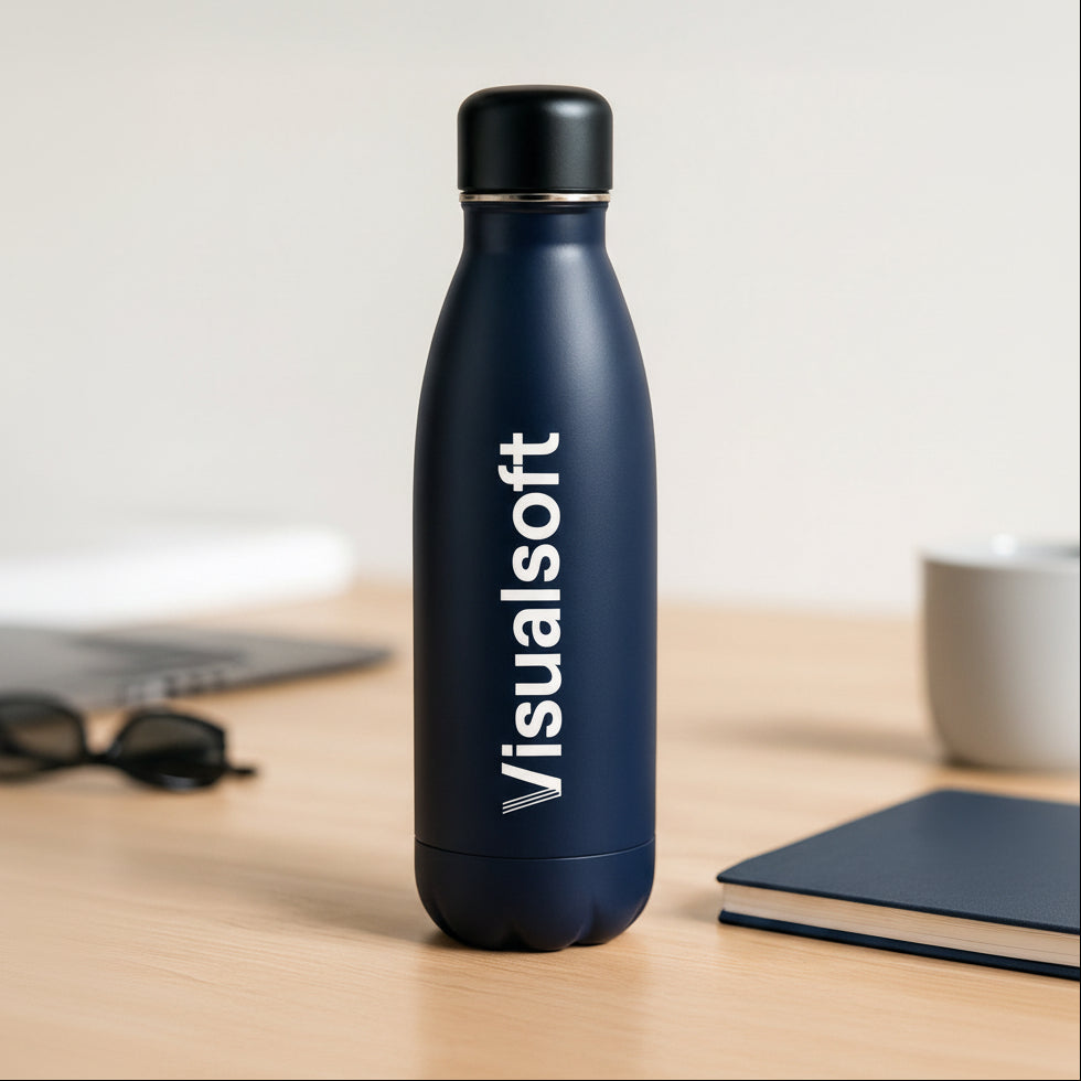 Navy blue water bottle with Visualsoft logo on a wooden desk
