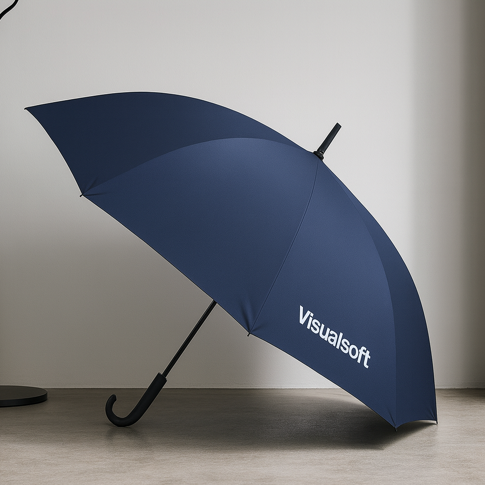 A dark blue umbrella with the Visualsoft logo in white on its side, resting on a light-colored floor.