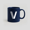 Navy blue mug with a white V logo